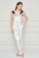 White silk lace women's pajama set by MANITO featuring a stylish flapper-inspired design and delicate lace details.