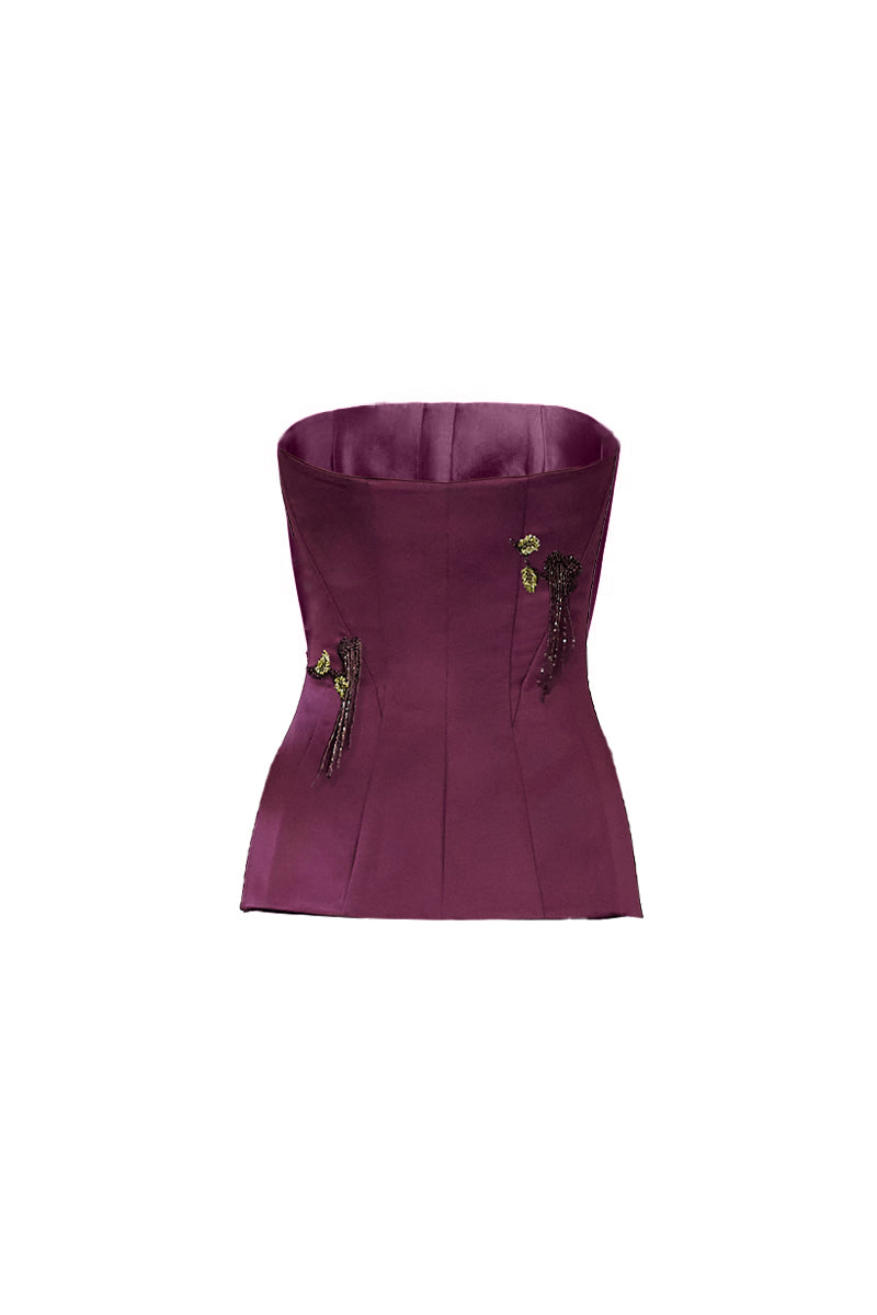 Purple flare corset top by Yassmin Saleh with a ghost back design, featuring a fitted silhouette and stylish flare details.