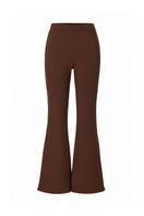 Brown flare sweatpants by Bassigue, featuring a relaxed fit and comfortable fabric, shown on a model in a casual setting.