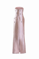 Pink Flicker gown by Yassmin Saleh featuring a ghost back design, elegant fabric, and flowing silhouette.