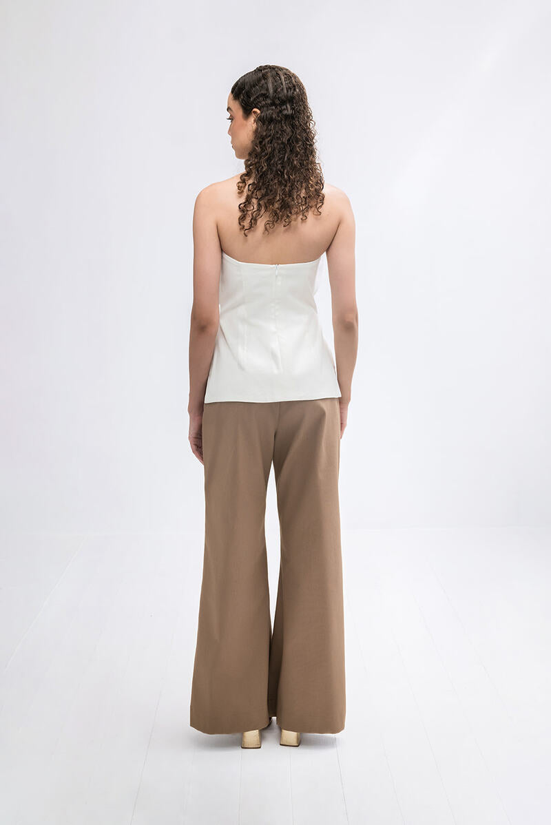 Tan floral pants by ANA + MARIA with a relaxed fit, featuring a vibrant floral pattern and lightweight fabric.