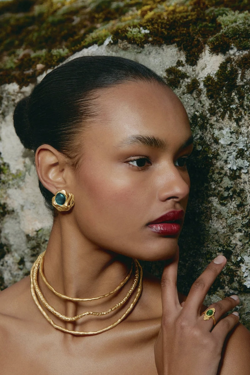 Gold and blue flow earrings by Jude Benhalim featuring elegant, flowing design with metallic finish.