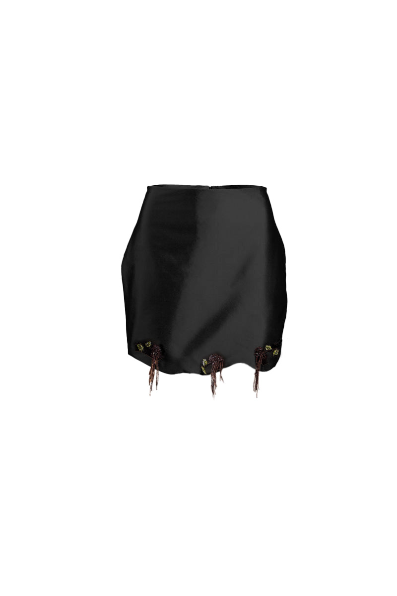 Black fold mini skirt by YASSMIN SALEH featuring a stylish front fold design, perfect for casual or chic outfits.
