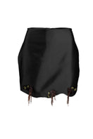 Black fold skirt by Yassmin Saleh, stylish mini skirt with a fold detail, shown from the front.