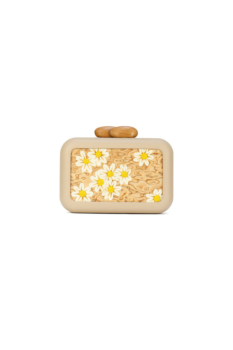Beige clutch bag with intricate daisy embroidery by Sy&Vie, featuring elegant floral detailing and a sleek design.