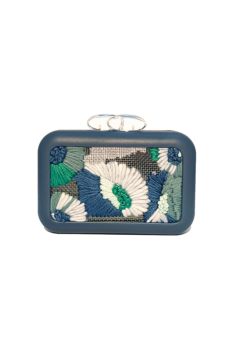 Blue Folhata Flora Grid clutch bag by Sy&Vie with a floral pattern, featuring a compact design and stylish appearance.