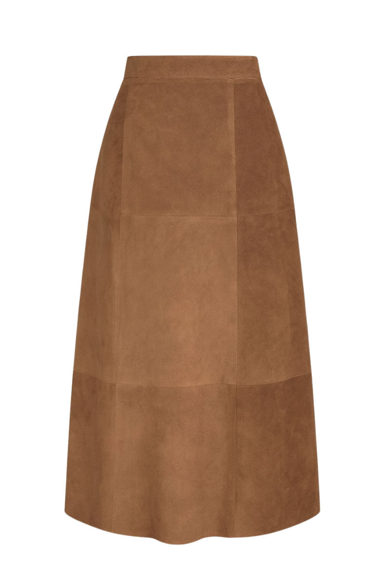 ZUT tan maxi skirt with flowing fabric and waistband, styled for casual or dressy occasions.