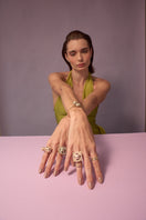 Green Sopo Garcia Band Ring by Álvaro Ávila, featuring a sleek band design with vibrant green color and modern style.
