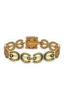Green Maravilla wide bracelet by Álvaro Ávila featuring intricate designs and a polished finish.