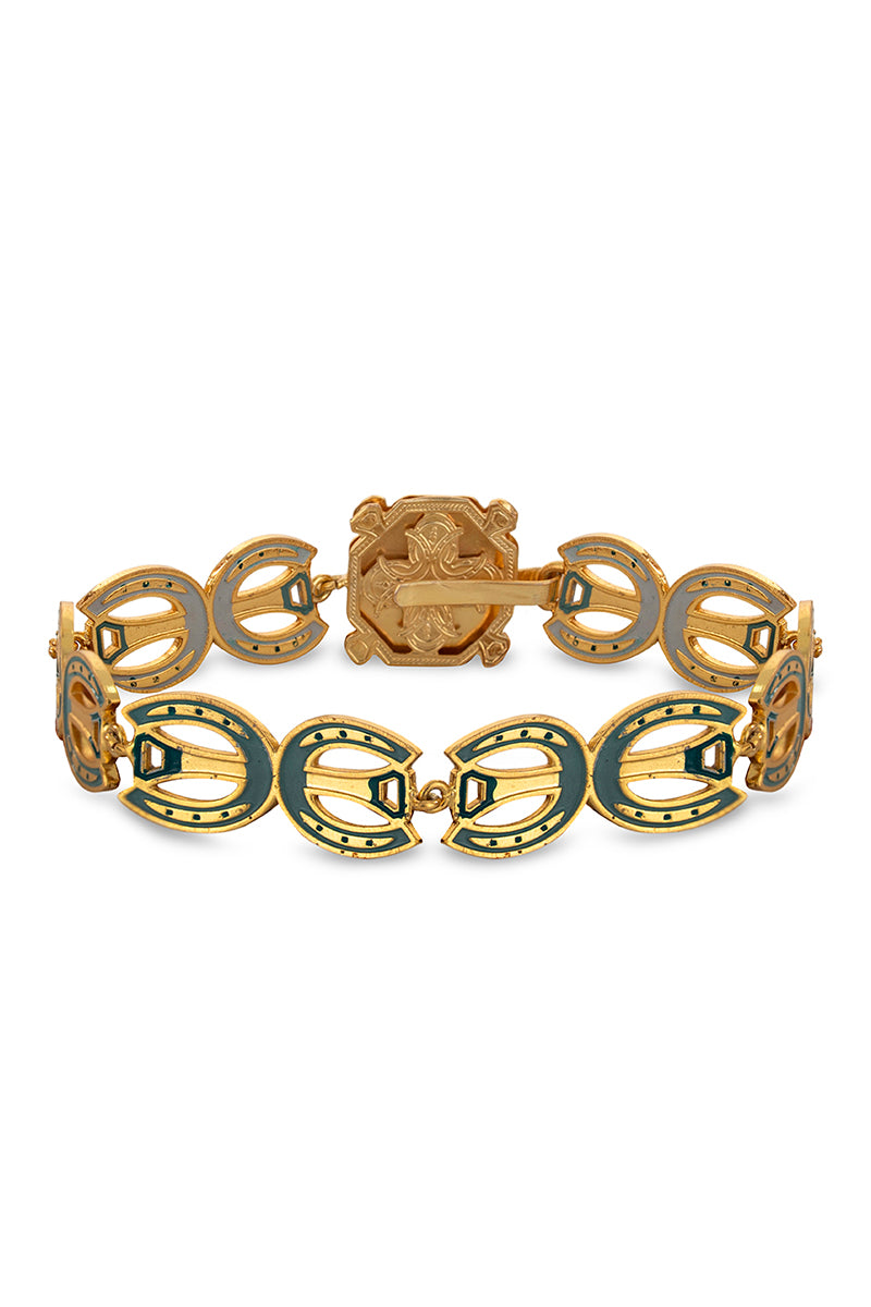 Green Maravilla wide bracelet by Álvaro Ávila featuring intricate designs and a polished finish.