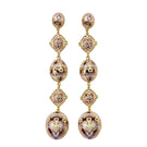 Lavender Amuleto Drop Earrings by Álvaro Ávila featuring elegant, elongated earrings with a delicate, artistic design.