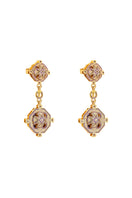 Lavender Campo statement earrings by Álvaro Ávila featuring bold, artistic design with intricate details on gold-tone earrings.