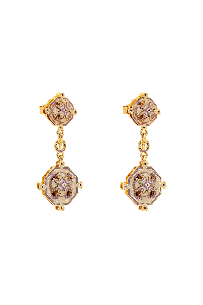 Lavender Campo statement earrings by Álvaro Ávila featuring bold, artistic design with intricate details on gold-tone earrings.