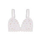 White patterned bralette from Ellipse Lingerie with delicate lace details, soft fabric, and adjustable straps.