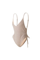 Beige Francesca swimsuit by Suncillo, featuring a stylish one-piece design with smooth fabric and flattering fit.