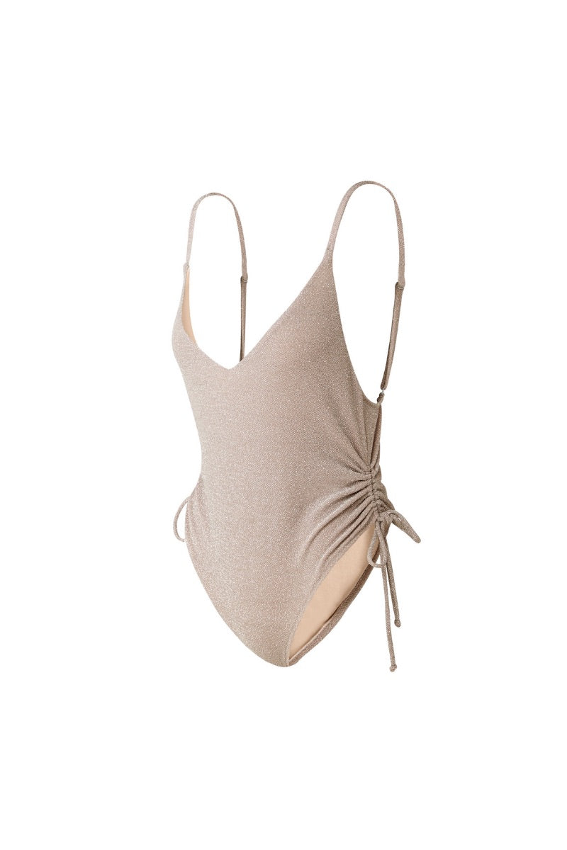 Beige Francesca swimsuit by Suncillo, featuring a stylish one-piece design with smooth fabric and flattering fit.