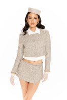 Nana Jacqueline Francesca cropped coat in neutral fabric, shown on a model with a stylish collar and tailored fit.