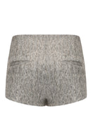 Back view of Nana Jacqueline Francesca mini skirt showing its fitted design and stylish silhouette.