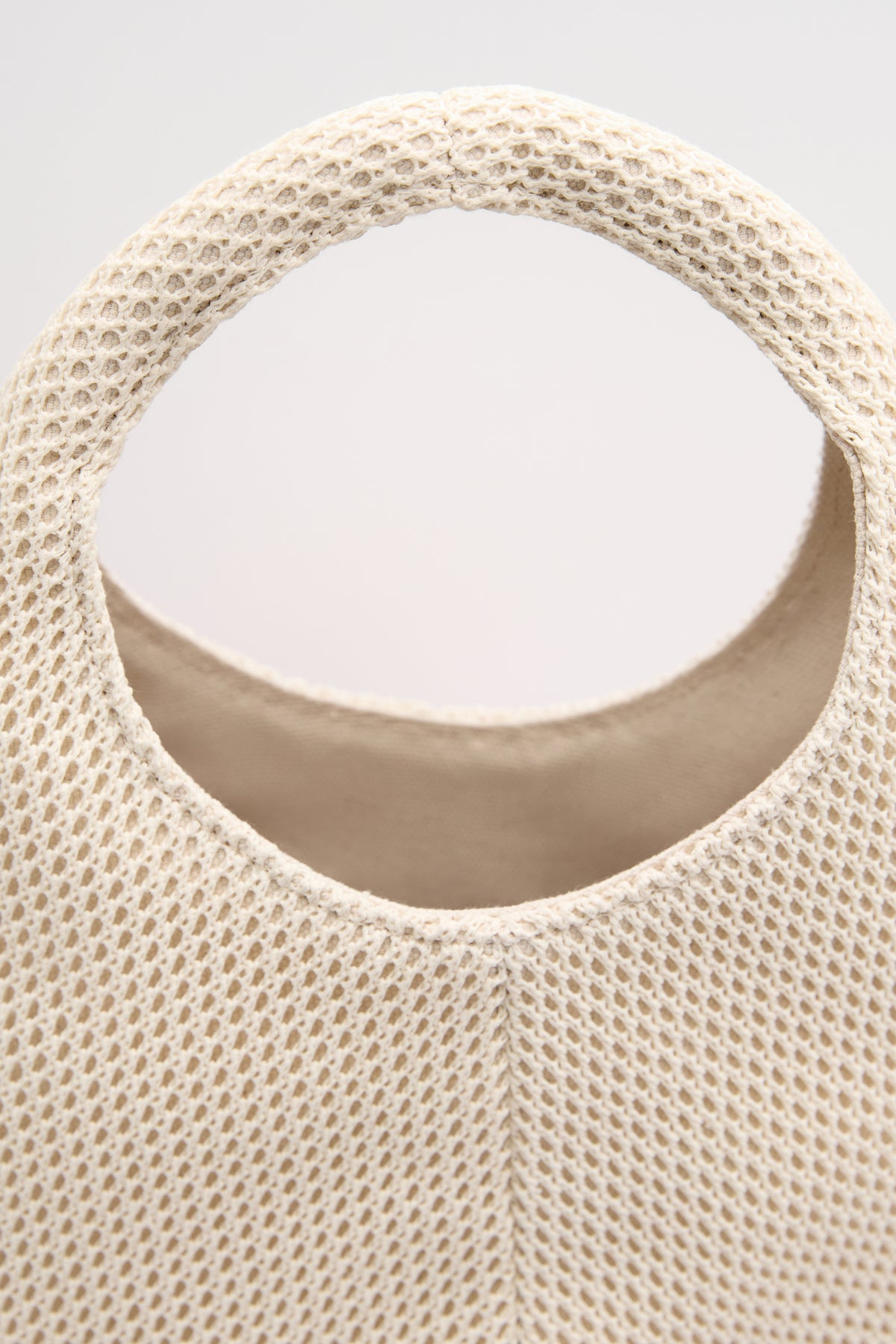 White POELLE Francesca top handle bag with elegant design and structured shape, featuring a smooth leather finish.