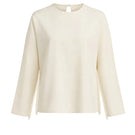 Ivory white long-sleeve top with fringe details from Stolen Stores, featuring a stylish and boho-chic design.