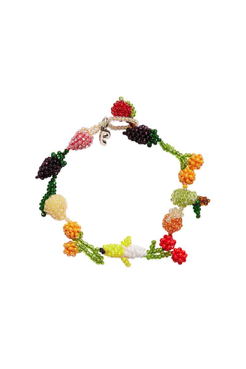 Colorful fruit salad galore bracelet by Pura Utz featuring vibrant beaded fruit charms and playful design.