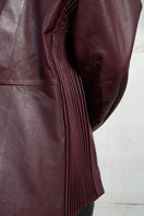 Wine red leather blazer by MAZ Manuela Álvarez featuring tailored fit and stylish lapels, perfect for smart casual wear.