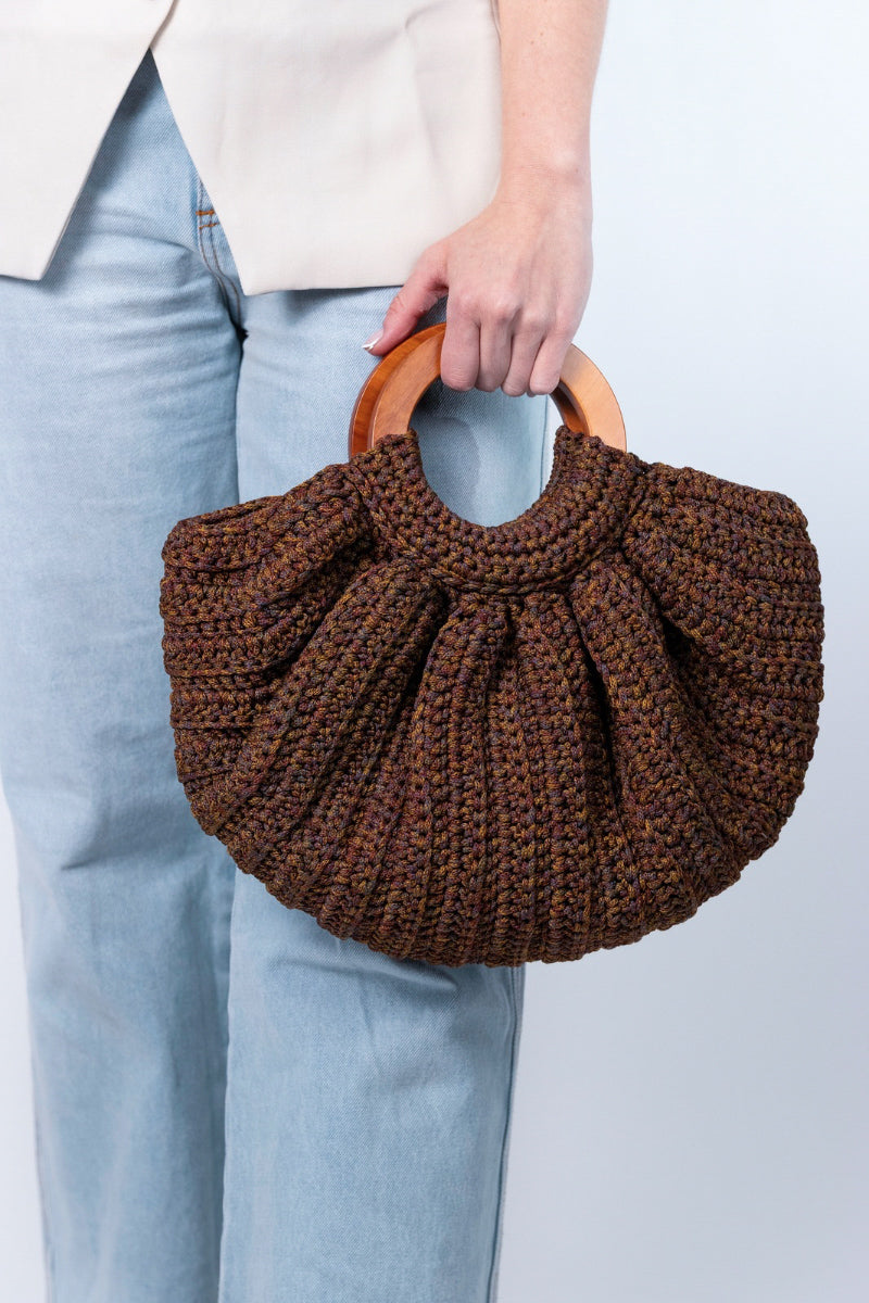 Mara Brazil GAIA top handle bag in brown leather with structured design and dual top handles.