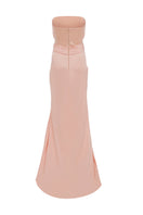 Light salmon YUNA gown by MOON / HAKAAN YILDIRIM displayed on ghostback mannequin, showcasing elegant fabric and flowing design.
