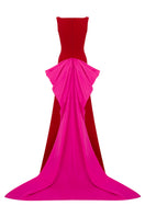 Red GRANATO gown by MOON / HAKAAN YILDIRIM featuring elegant fabric and a flowing silhouette.