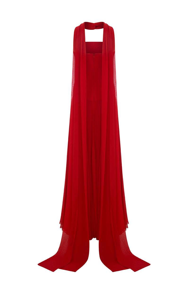 Red Moon Hakaan Yildirim Estrella gown with flowing fabric and elegant design, shown on a model against a neutral background.
