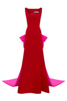 Red GRANATO gown by MOON / HAKAN YILDIRIM featuring elegant, flowing fabric and a stylish design perfect for formal occasions.