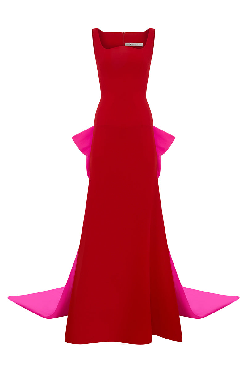 Red GRANATO gown by MOON / HAKAN YILDIRIM featuring elegant, flowing fabric and a stylish design perfect for formal occasions.