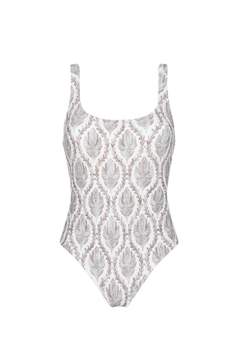 Aguaclara Sultana one-piece swimsuit with vibrant floral pattern, high neckline, and stylish design on a mannequin.
