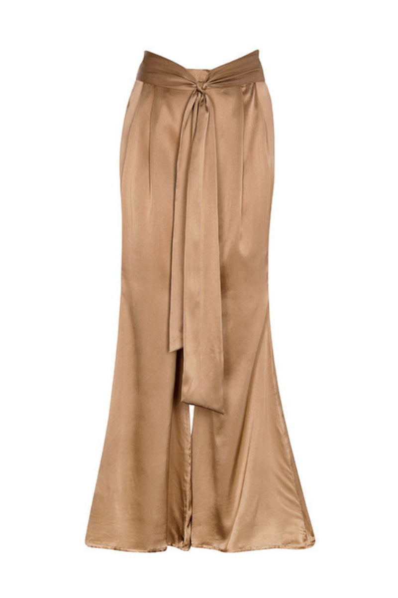 Aguaclara Dune pants featuring a relaxed fit with earthy tones and a comfortable waistband, displayed on a hanger.