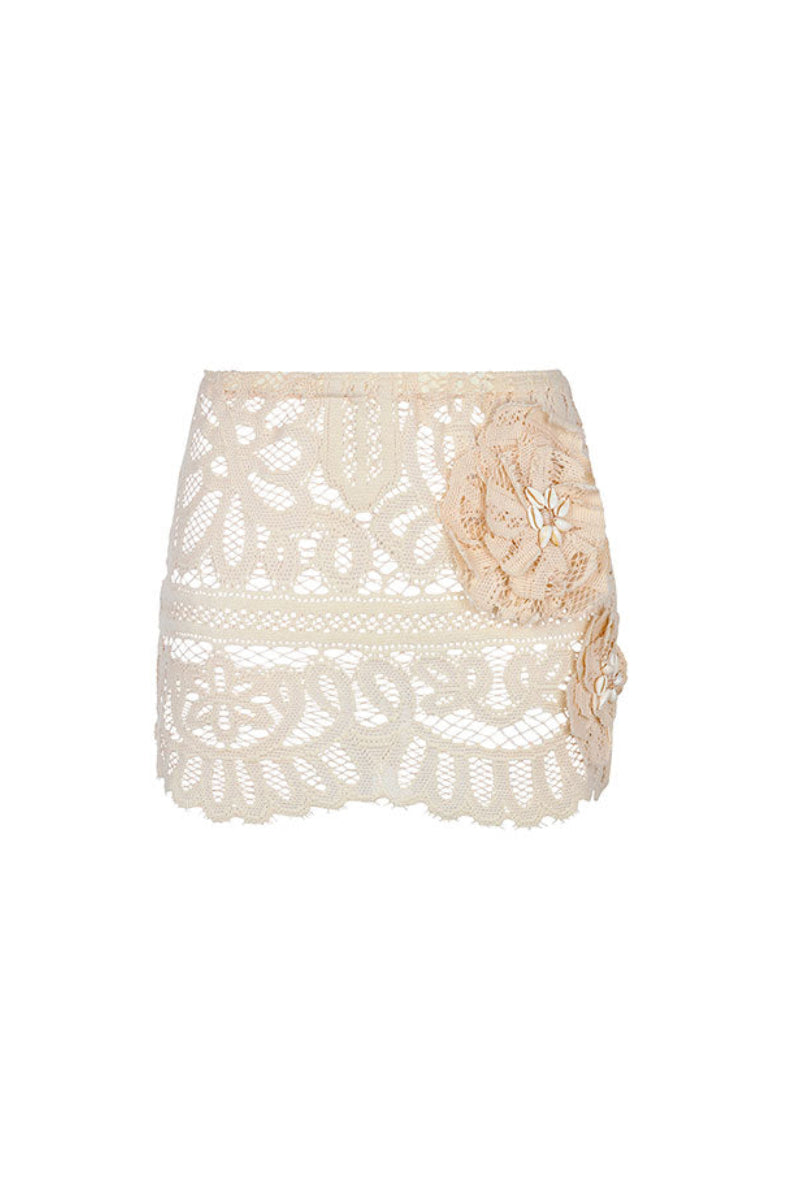 Aguaclara La Perle mini skirt in a stylish design, featuring a fitted silhouette and delicate fabric, shown on a neutral background.