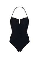 A Aguaclara black one-piece swimsuit with a sleek design, shown on a model against a neutral background.