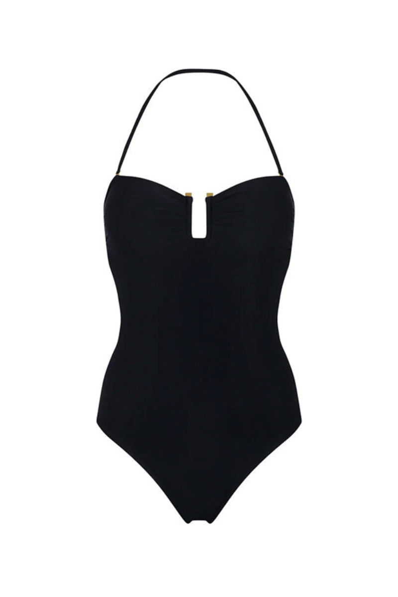 A Aguaclara black one-piece swimsuit with a sleek design, shown on a model against a neutral background.