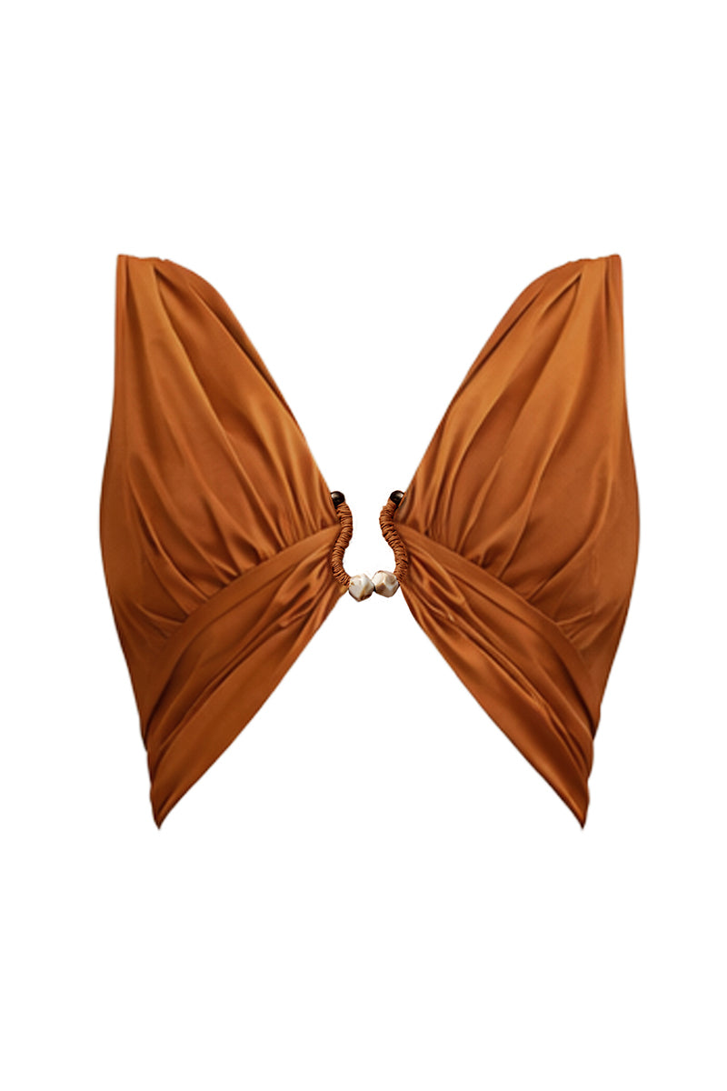 Andrea Iyamah GIA crop top in burnt orange, featuring a stylish sleeveless design with a fitted silhouette.