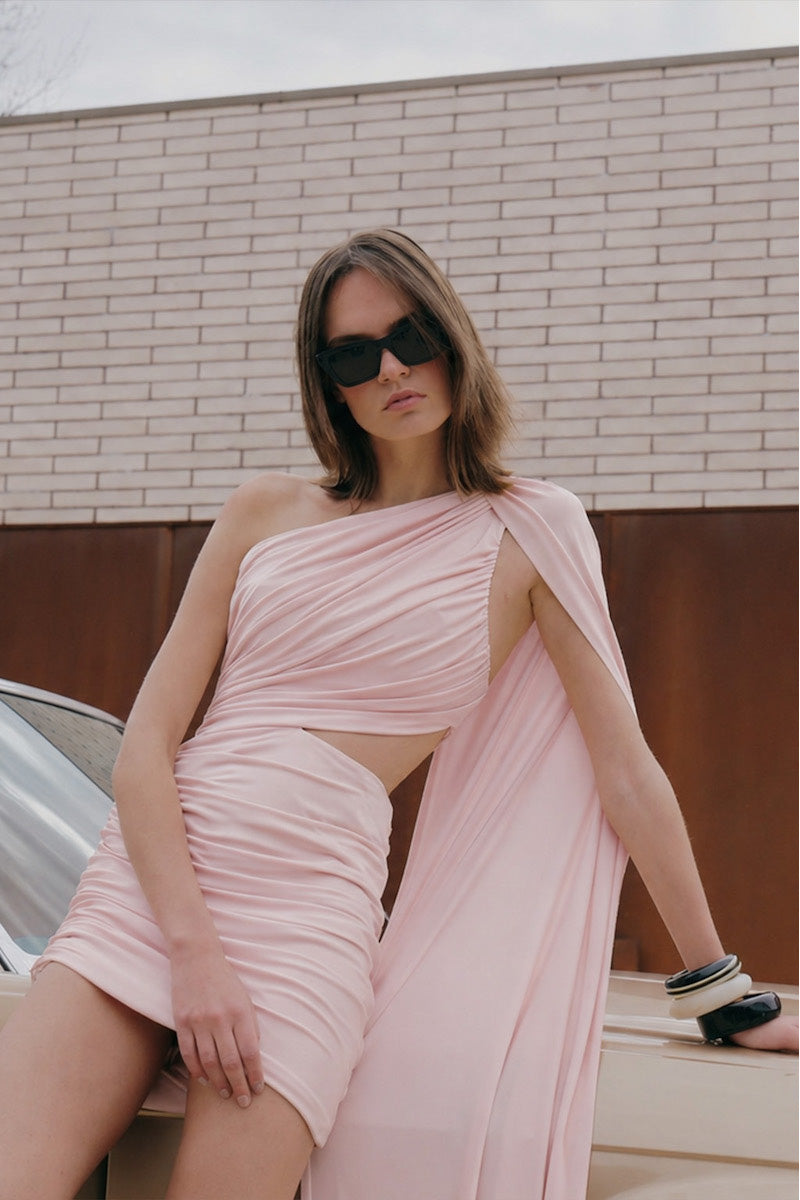 Gigii's Capella dress in Ballerina Pink, a stylish mini dress with a flowy fabric and elegant design perfect for casual or semi-formal wear.