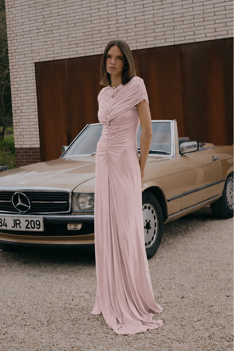 Pink Solita maxi dress in ballerina pink by Gigii's, featuring flowing fabric and elegant design, perfect for stylish occasions.