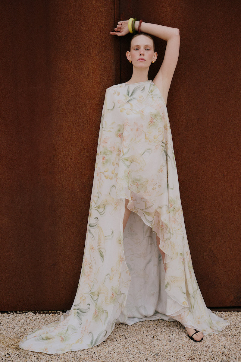 Floral ZETA maxi dress by Gigii's with a flowing silhouette and vibrant floral pattern, perfect for summer or casual occasions.