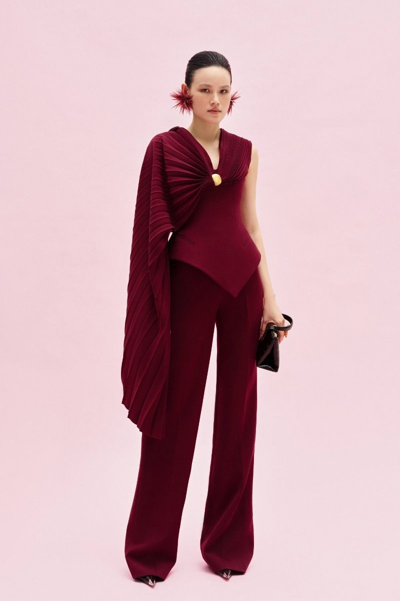 Jenny K Tran Giselle Pants in black, stylish and slim-fit, shown on a model with a high waist and tailored design.