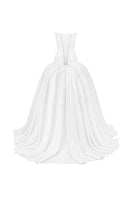 White cut-out silk gown by Phan Huy, showcasing a sleek design with elegant cut-outs and smooth fabric, front view.