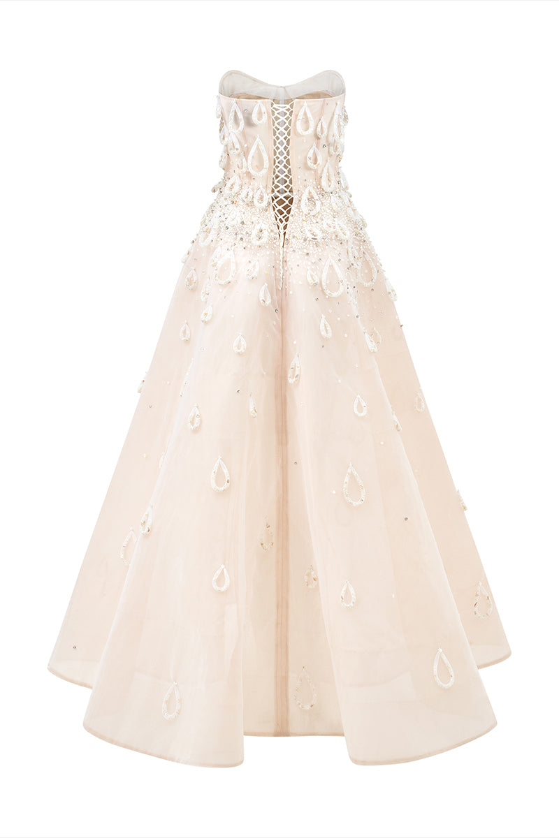 Phan Huy A-line sheer tulle gown with hand-embroidered beads, showcasing elegant back view and intricate detailing.