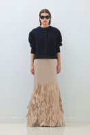 Hand embroidered gold whale design maxi skirt by TAGG, featuring intricate gold embroidery on flowing fabric.