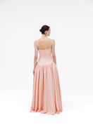 Studio NK peach maxi dress from the Grace collection, featuring flowing fabric and elegant design, perfect for summer wear.