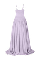 Studio NK violet maxi dress from the Grace Dress collection, featuring a flowing fabric and elegant design.