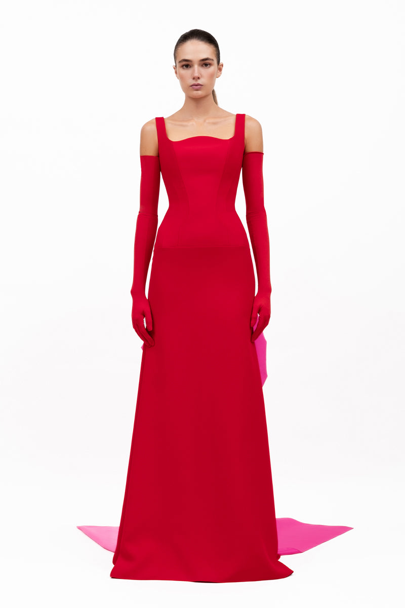Red GRANATO gown by MOON / HAKAN YILDIRIM, featuring elegant fabric and detailed design, perfect for formal occasions.