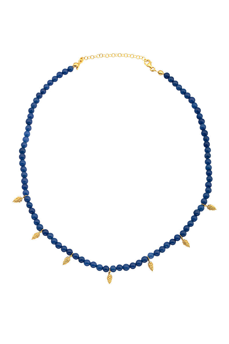 Navy blue Grappa necklace by PERACAS featuring a sleek, modern design with a stylish pendant on a matching chain.
