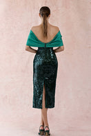 Green Big Bowtie Dress gown by HACCHIC COUTURE featuring a vibrant green fabric and a large stylish bow at the waist.